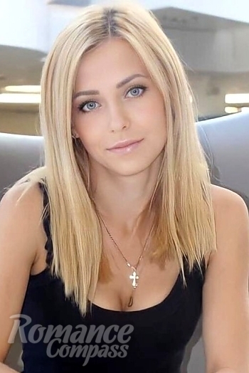Ukrainian mail order bride Alina from Copengagen with blonde hair and green eye color - image 1