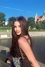 Ukrainian mail order bride Anastasia from Warsaw with black hair and green eye color - image 7