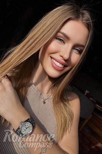 Ukrainian mail order bride Anastasia from Paris with blonde hair and green eye color - image 1