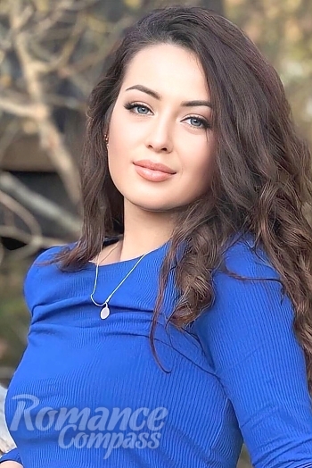 Ukrainian mail order bride Solomiia from Kiev with light brown hair and green eye color - image 1