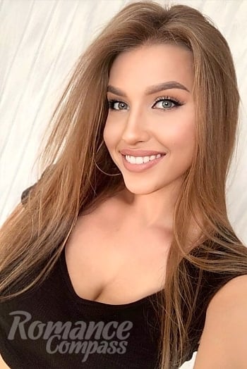 Ukrainian mail order bride Marianna from Odessa with light brown hair and green eye color - image 1