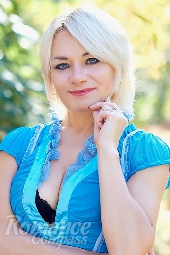 Ukrainian mail order bride Alena from Odesa with blonde hair and blue eye color - image 1