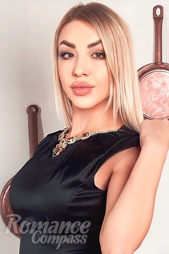 Ukrainian mail order bride Anna from Prague with blonde hair and brown eye color - image 1