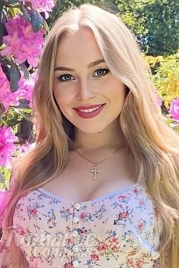 Ukrainian mail order bride Irina from Kiev with blonde hair and blue eye color - image 1