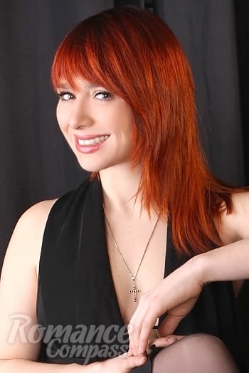 Ukrainian mail order bride Kateryna from Kiev with red hair and grey eye color - image 1