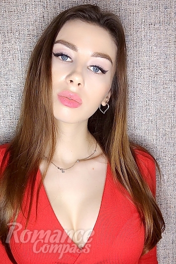 Ukrainian mail order bride Nicoleta from Floresti with light brown hair and blue eye color - image 1