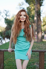 Ukrainian mail order bride Julia from Kriviy Rih with auburn hair and brown eye color - image 9