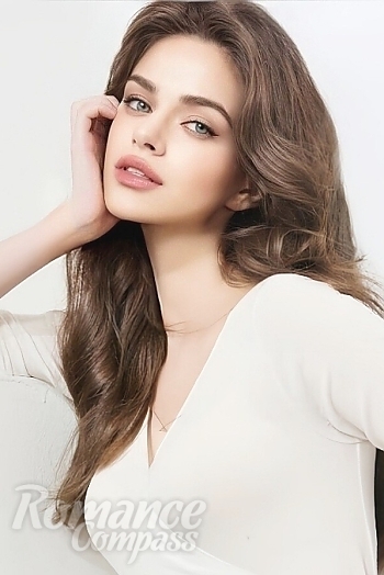 Ukrainian mail order bride Anna from Seoul with light brown hair and grey eye color - image 1