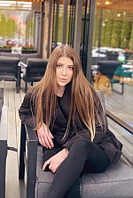 Ukrainian mail order bride Yulia from Warsaw with light brown hair and blue eye color - image 5