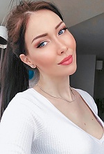 Ukrainian mail order bride Alina from Warsaw with light brown hair and blue eye color - image 9