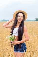 Ukrainian mail order bride Lyudmila from Warsaw with black hair and brown eye color - image 12