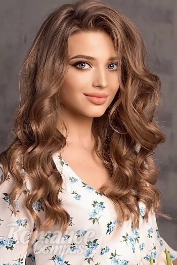 Ukrainian mail order bride Mariana from Kiev with light brown hair and blue eye color - image 1
