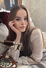 Ukrainian mail order bride Ruslana from Kiev with light brown hair and green eye color - image 7