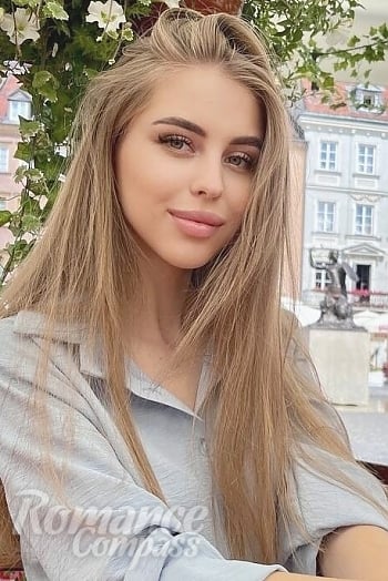 Ukrainian mail order bride Anna from Kiev with light brown hair and green eye color - image 1