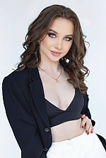 Ukrainian mail order bride Bogdana from Warsaw with light brown hair and blue eye color - image 2