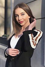 Ukrainian mail order bride Bogdana from Warsaw with light brown hair and blue eye color - image 3