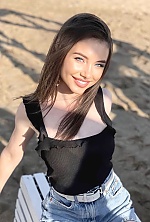 Ukrainian mail order bride Bogdana from Warsaw with light brown hair and blue eye color - image 5