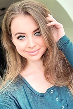 Ukrainian mail order bride Anastasia from Kiev with light brown hair and green eye color - image 3