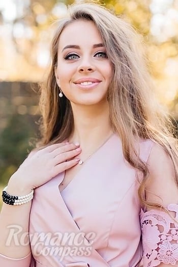 Ukrainian mail order bride Anastasia from Kiev with light brown hair and green eye color - image 1