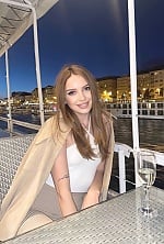 Ukrainian mail order bride Darina from Warsaw with light brown hair and green eye color - image 3