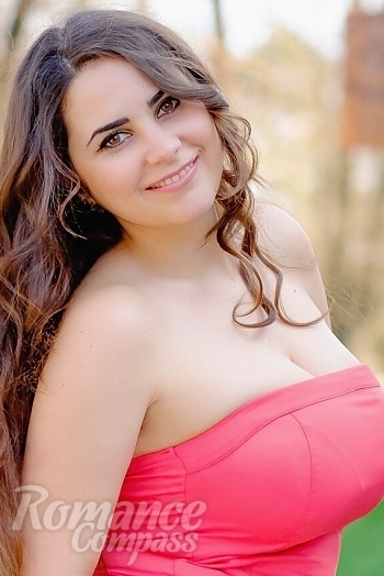 Ukrainian mail order bride Oksana from Odesa with brunette hair and black eye color - image 1