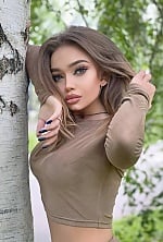 Ukrainian mail order bride Arina from Warsaw with light brown hair and brown eye color - image 2