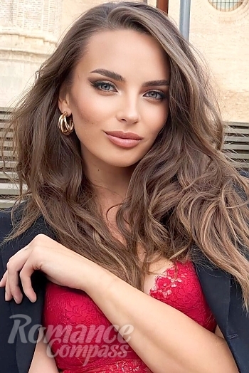 Ukrainian mail order bride Irina from Warsaw with light brown hair and green eye color - image 1