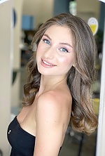 Ukrainian mail order bride Tetiana from Warsaw with light brown hair and blue eye color - image 9