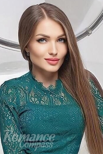 Ukrainian mail order bride Natalia from Kiev with light brown hair and blue eye color - image 1