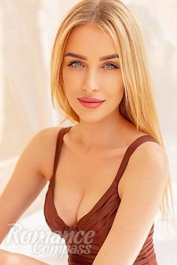 Ukrainian mail order bride Antonina from Kiev with blonde hair and blue eye color - image 1