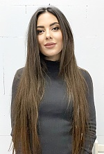 Ukrainian mail order bride Ludmyla from Warsaw with light brown hair and green eye color - image 4