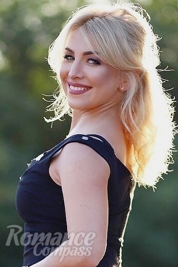 Ukrainian mail order bride Oksana from Lutsk with blonde hair and green eye color - image 1