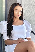 Ukrainian mail order bride Delia from Bucharest with black hair and brown eye color - image 8