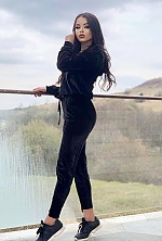 Ukrainian mail order bride Delia from Bucharest with black hair and brown eye color - image 4