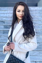 Ukrainian mail order bride Delia from Bucharest with black hair and brown eye color - image 10