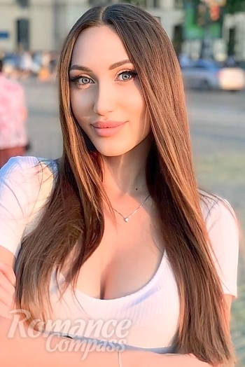 Ukrainian mail order bride Daria from Odessa with light brown hair and blue eye color - image 1