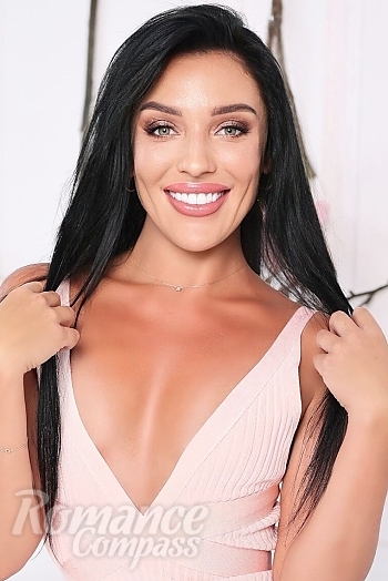 Ukrainian mail order bride Alina from Warsaw with black hair and green eye color - image 1
