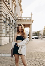 Ukrainian mail order bride Alina from Warsaw with light brown hair and blue eye color - image 2