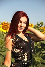 Ukrainian mail order bride Yulia from Warsaw with red hair and green eye color - image 4
