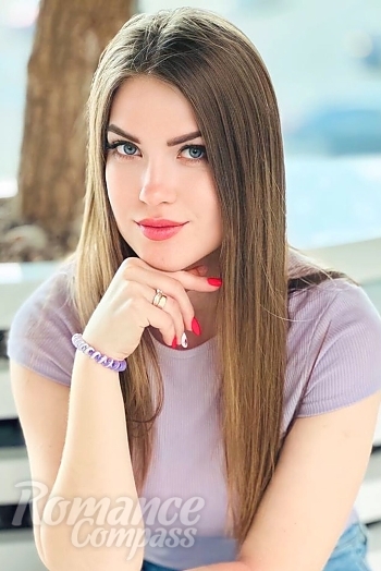 Ukrainian mail order bride Nataliia from Kiev with light brown hair and blue eye color - image 1
