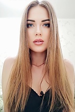 Ukrainian mail order bride Nataliia from Kiev with light brown hair and blue eye color - image 2