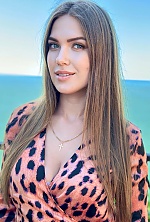 Ukrainian mail order bride Nataliia from Kiev with light brown hair and blue eye color - image 6