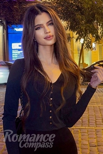 Ukrainian mail order bride Alona from Batumi with light brown hair and blue eye color - image 1