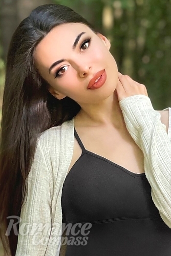 Ukrainian mail order bride Yulia from Kharkov with black hair and hazel eye color - image 1