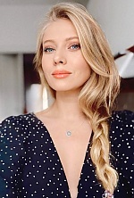 Ukrainian mail order bride Lyudmila from Kyiv with blonde hair and blue eye color - image 4