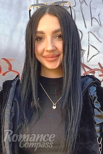Ukrainian mail order bride Alona from Lubny with black hair and brown eye color - image 1
