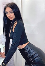 Ukrainian mail order bride Alona from Lubny with black hair and brown eye color - image 2