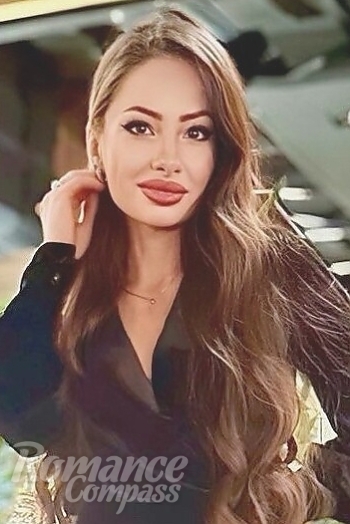 Ukrainian mail order bride Galina from Kyiv with light brown hair and blue eye color - image 1