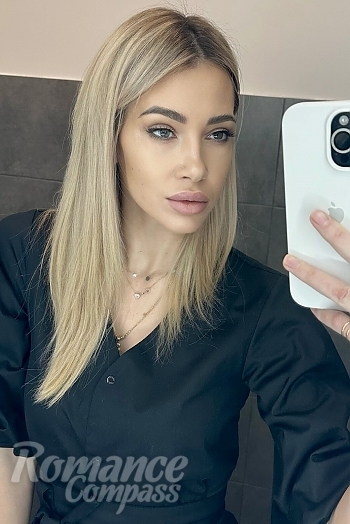 Ukrainian mail order bride Victoria from Kyiv with blonde hair and green eye color - image 1