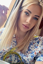 Ukrainian mail order bride Victoria from Kyiv with blonde hair and green eye color - image 2